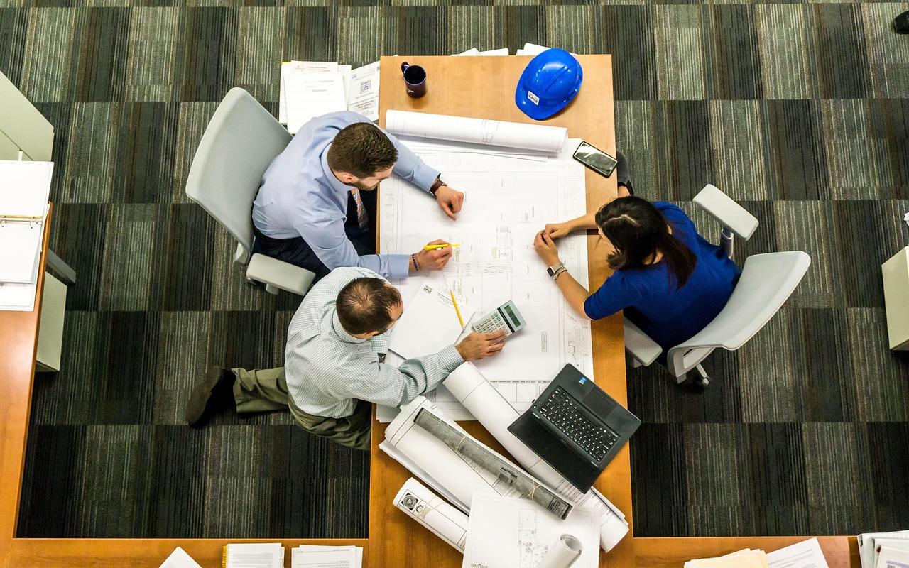 Senior practitioners in a focused working meeting